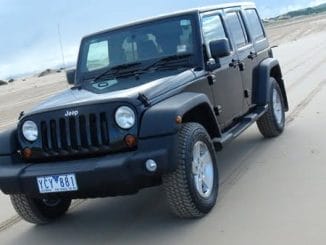 2011 Jeep Wrangler Unlimited front Side
