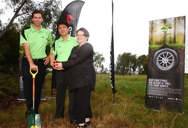 Kumho ambassador Grant Hackett with Kumho Australia managing director Mr Ki Young Kim and CEO of Greenfleet Sara Gipton