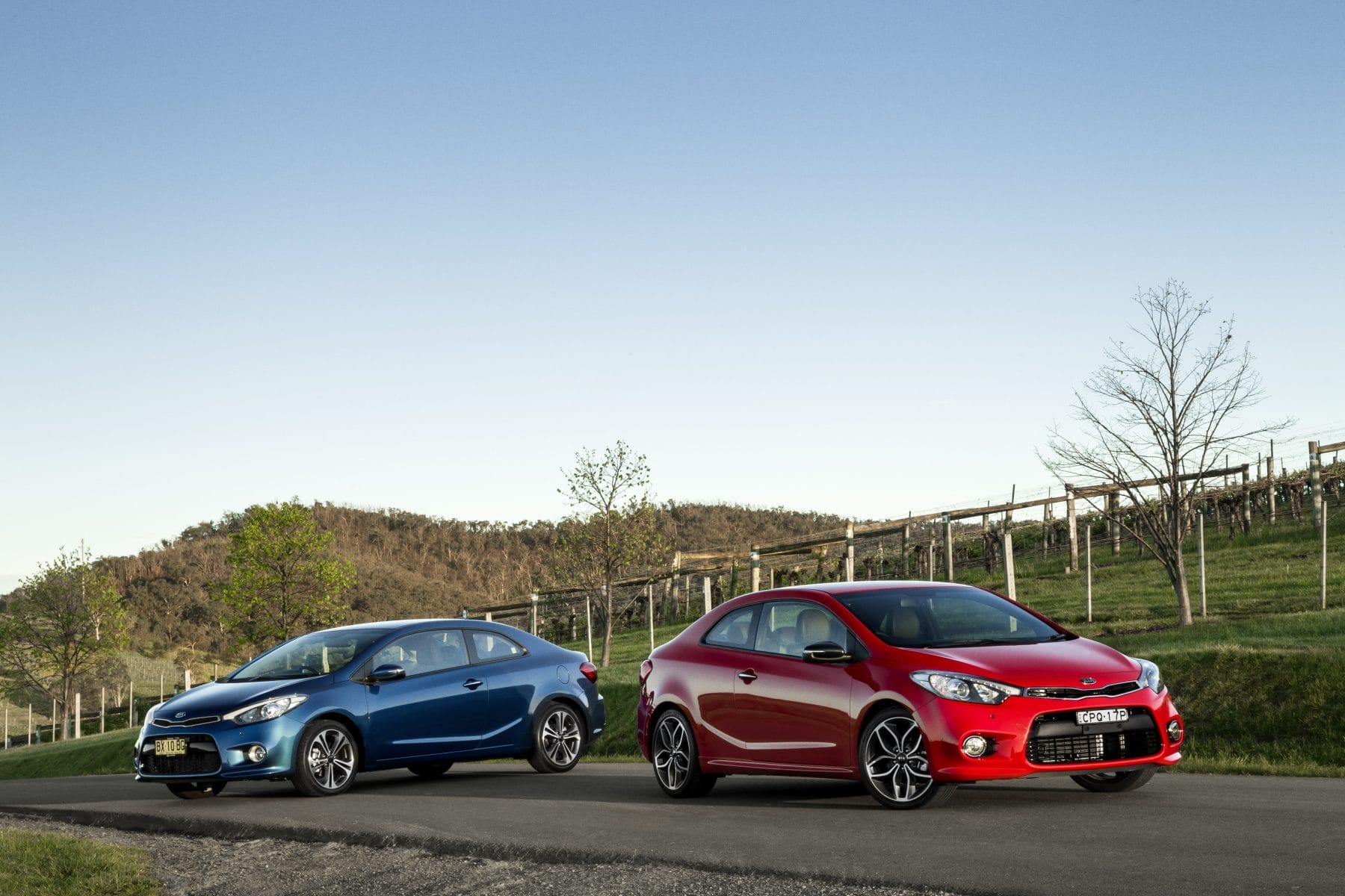 MY14 Kia Koup Si (left) & MY14 Kia Koup Turbo (right).