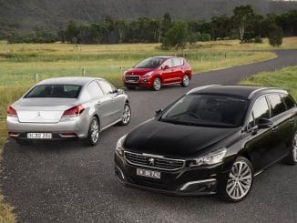 (Foreground) Peugeot 508 GT and (middle) 508 Allure and (background) 3008.