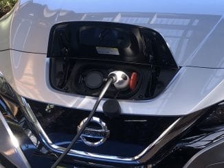 Nissan leaf zoomed in on charger
