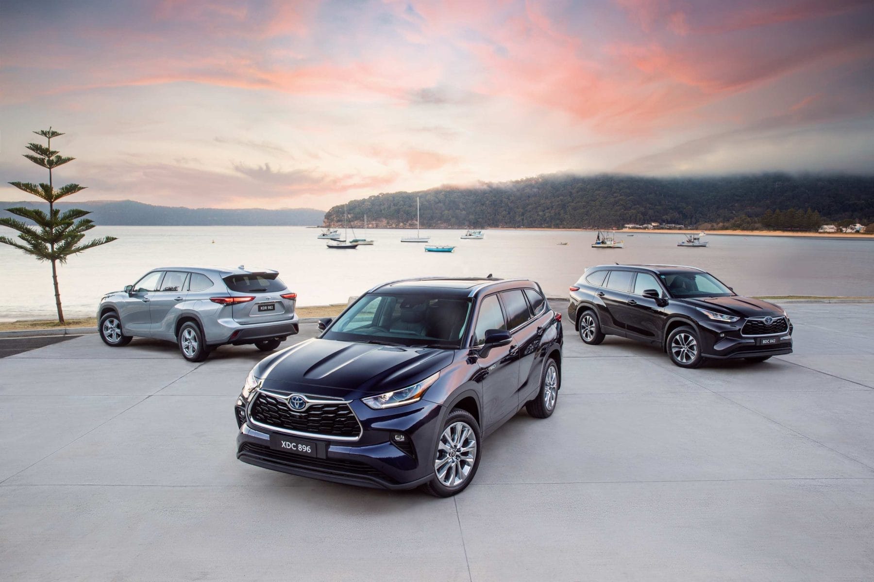 2021 Toyota Kluger range (L-R) GX petrol, Grande Hybrid, GXL Hybrid.