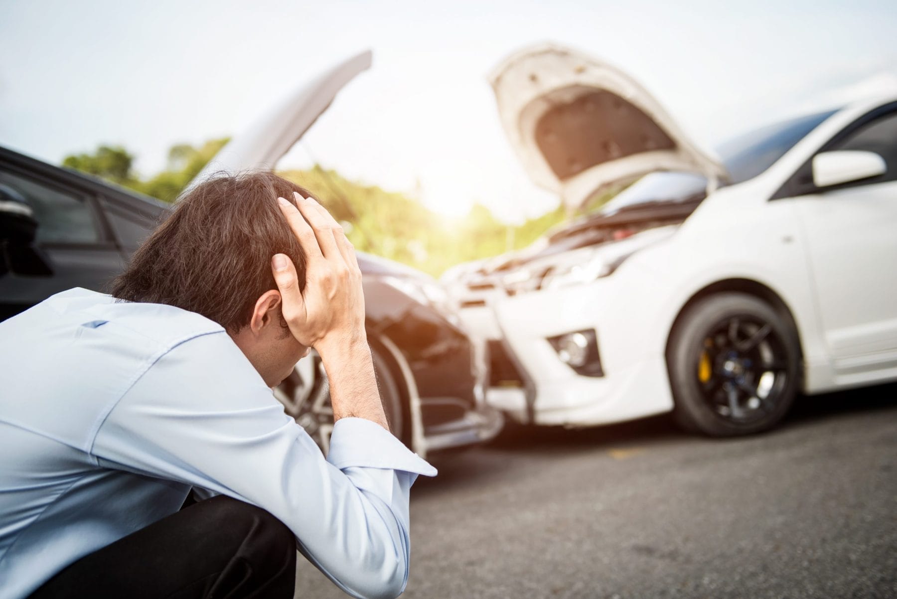 man driver man in front of automobile crash car collision accident in city road.