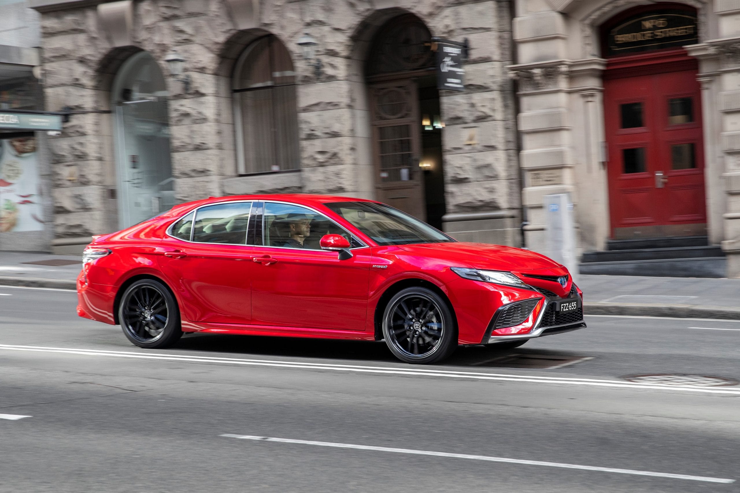 Toyota-Camry-SX-Hybrid-driving-scaled