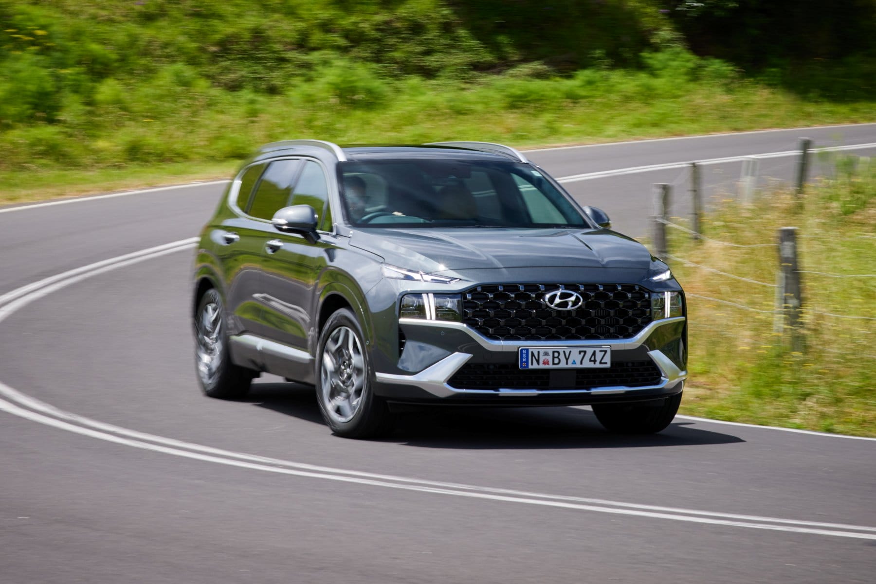 Hyundai Santa Fe Hybrid driving on road