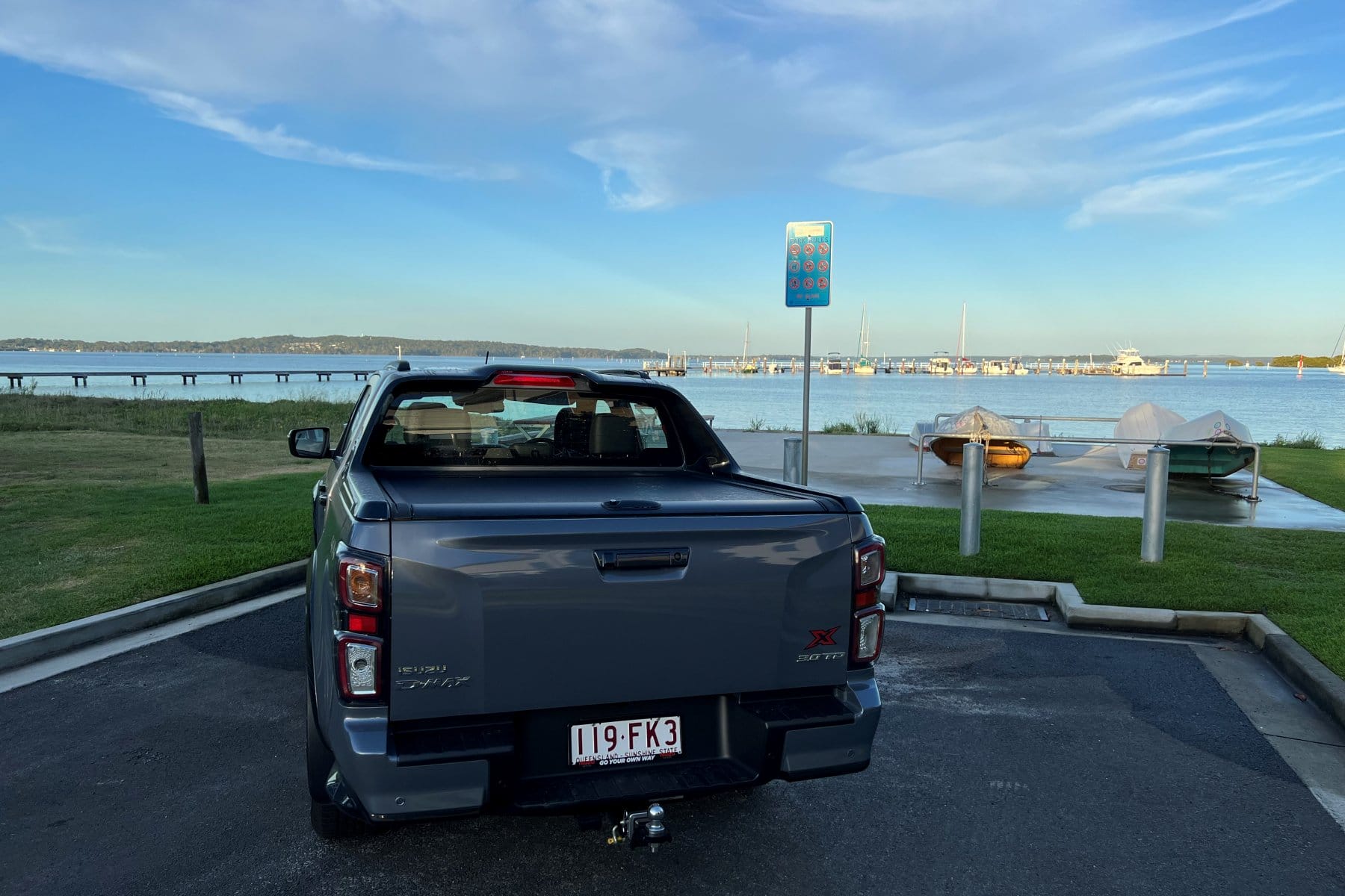 2023 Isuzu D-Max X-Terrain rear quarter on boat ramp sunrise