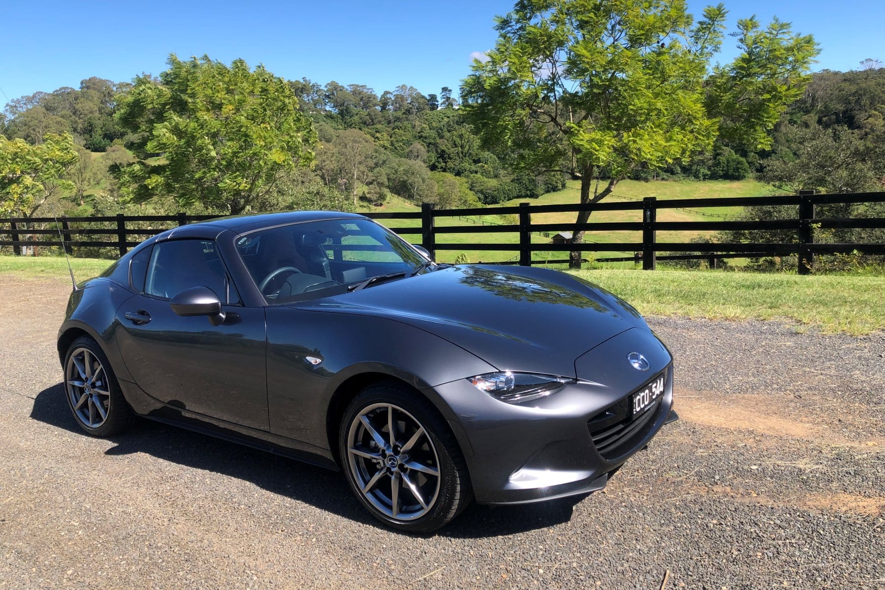 2023 Mazda MX-5 GT Convertible Black roof front quarter 1