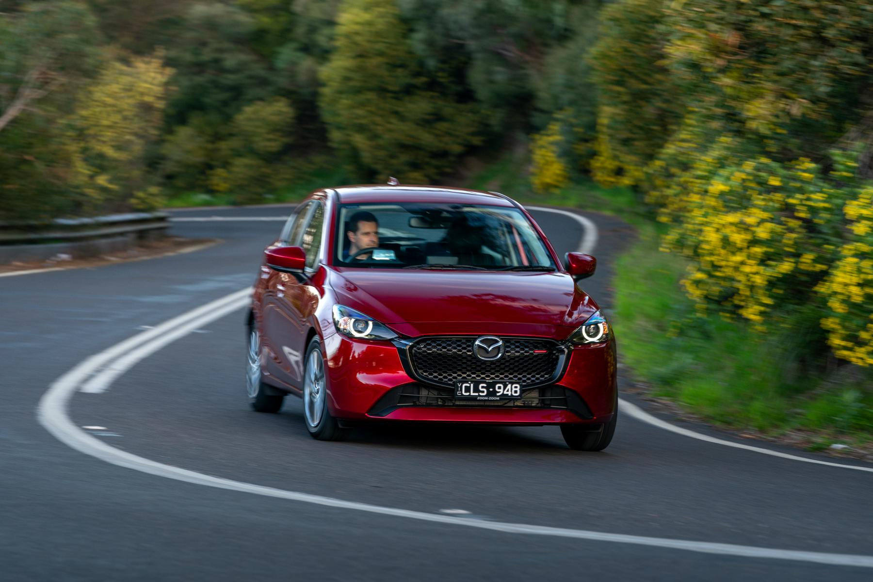 2023 Mazda2 Evolve Soul Red Crystal driving 1