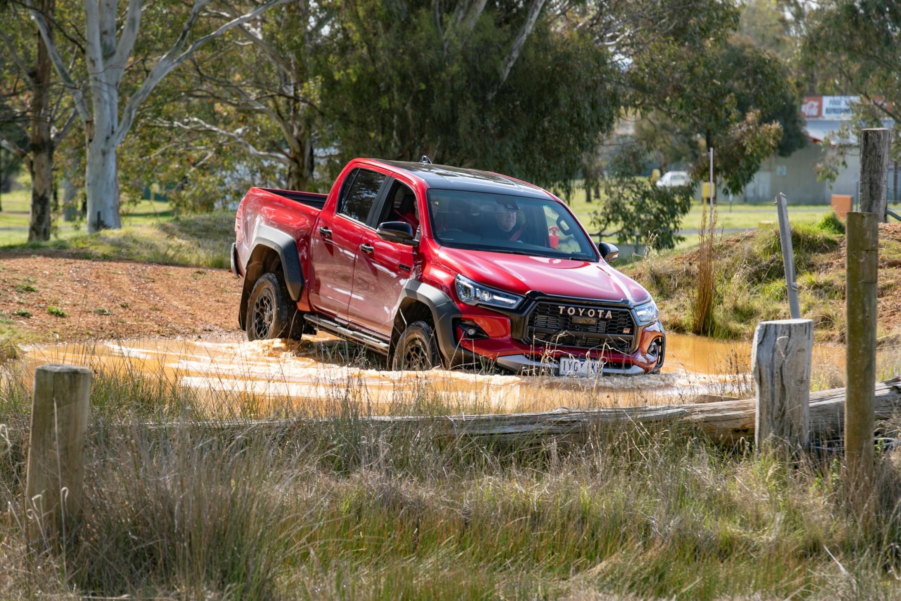2023 Toyota HiLux GR Sport. Filmed on a closed circuit under controlled conditions. Fresh water crossing shown.