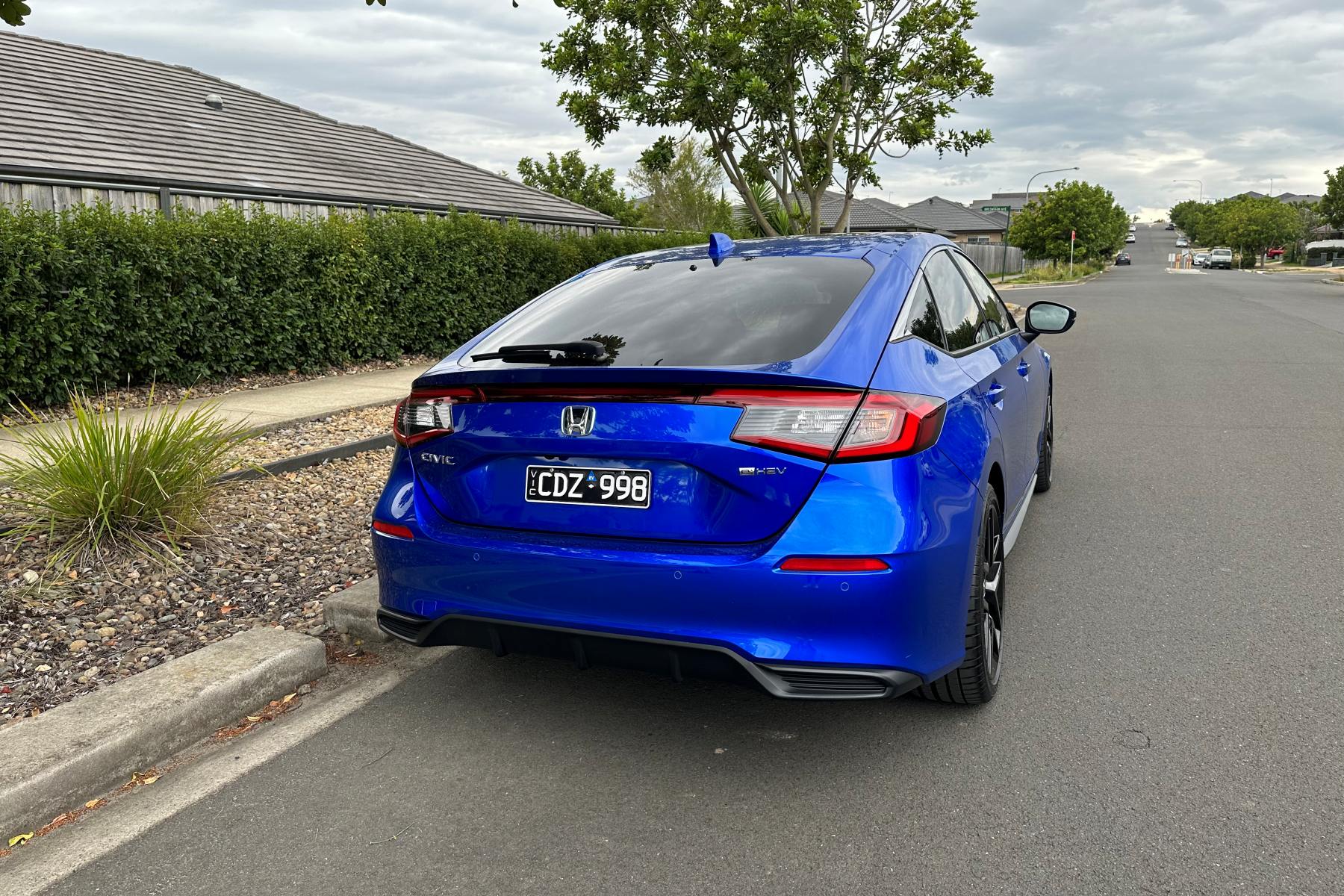 Honda Civic Hybrid e-HEV rear quarter 1