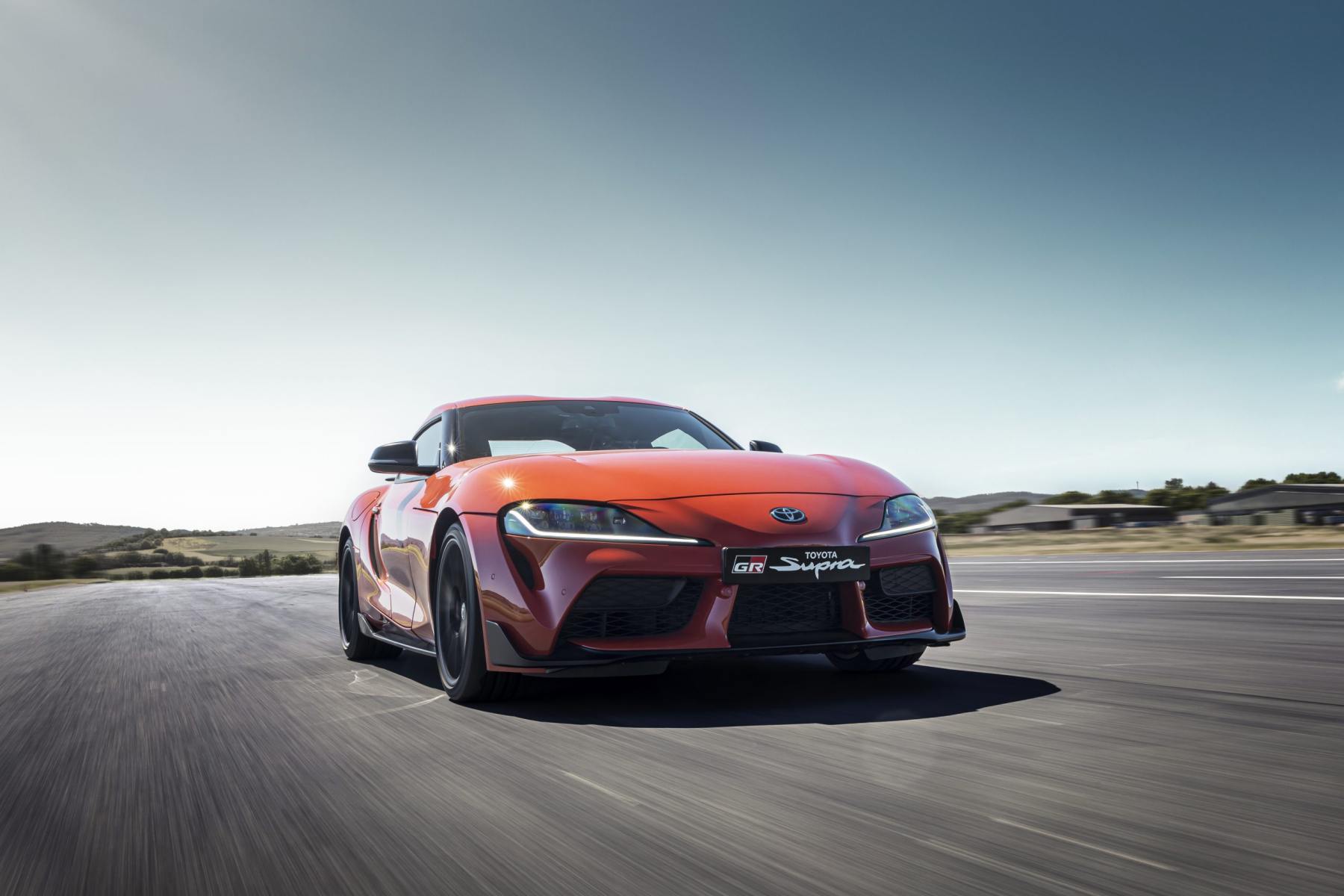 Toyota GR Supra with a Plasma Orange exterior finish (overseas model shown)