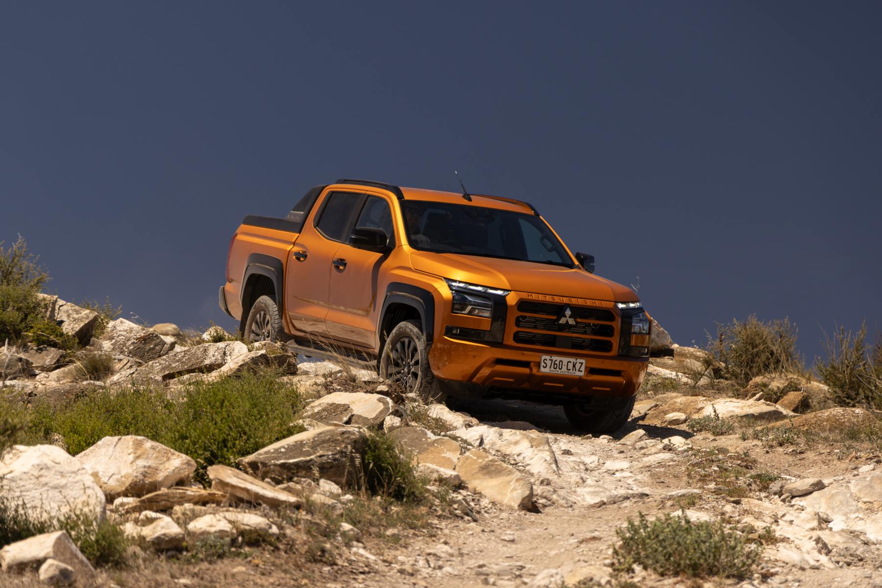 2024 Triton GSR Yambuki Orange driving off road 1