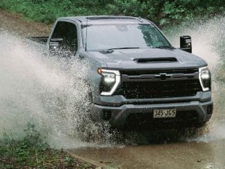 2024 Chevrolet Silverado 2500 HD Z71 LTZ Premium driving through water