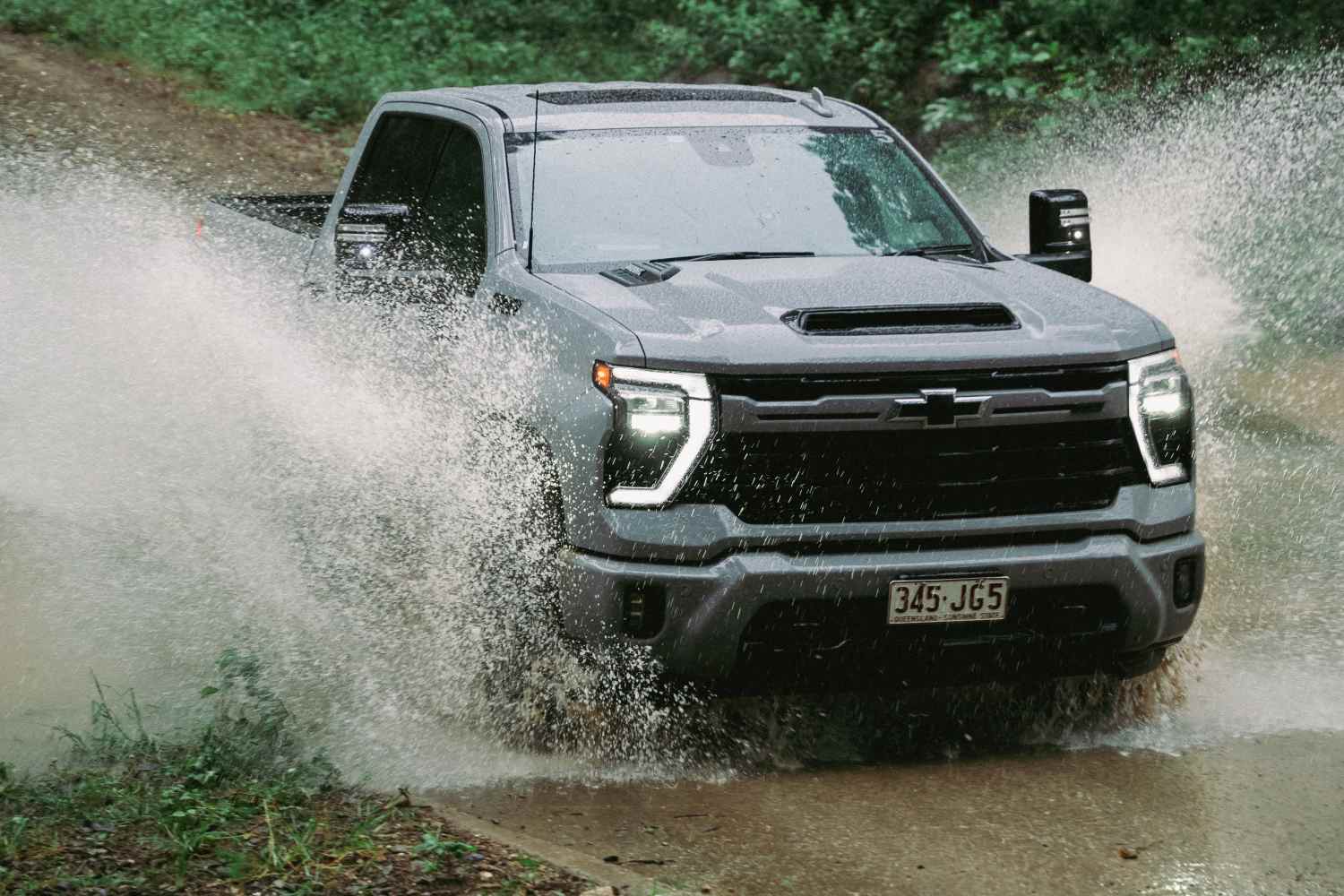 2024 Chevrolet Silverado 2500 HD Z71 LTZ Premium driving through water