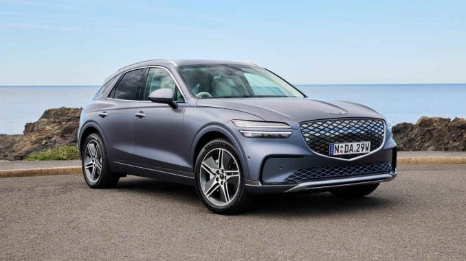 2025 Electrified GV70 front quarter and grill 1